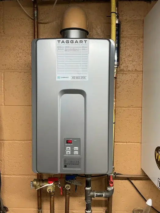 Rinnai tankless water heater wall-mounted in a Pittsburgh, PA basement